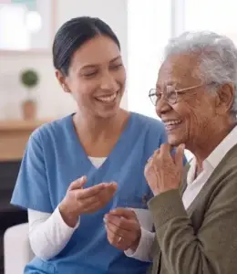 nurse assisting senior patient with care and support in Canada
