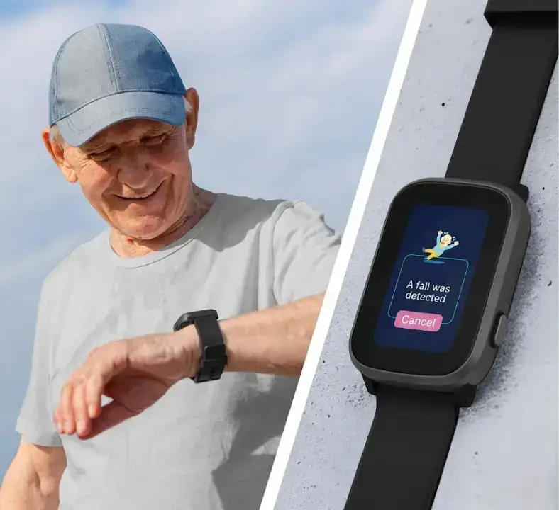 Senior man in Canada wearing the Go Anywhere Smartwatch with fall detection alert displayed on screen