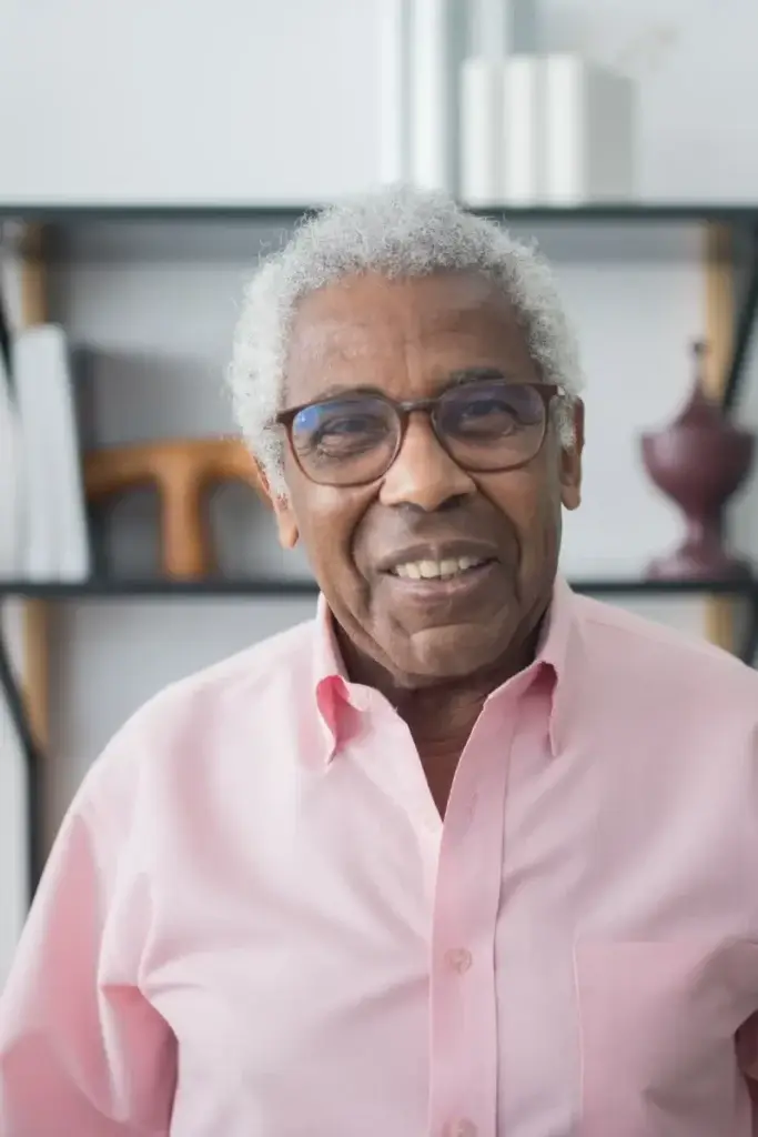 Smiling senior man at home representing independent living with Bedford Medical Alert Canada